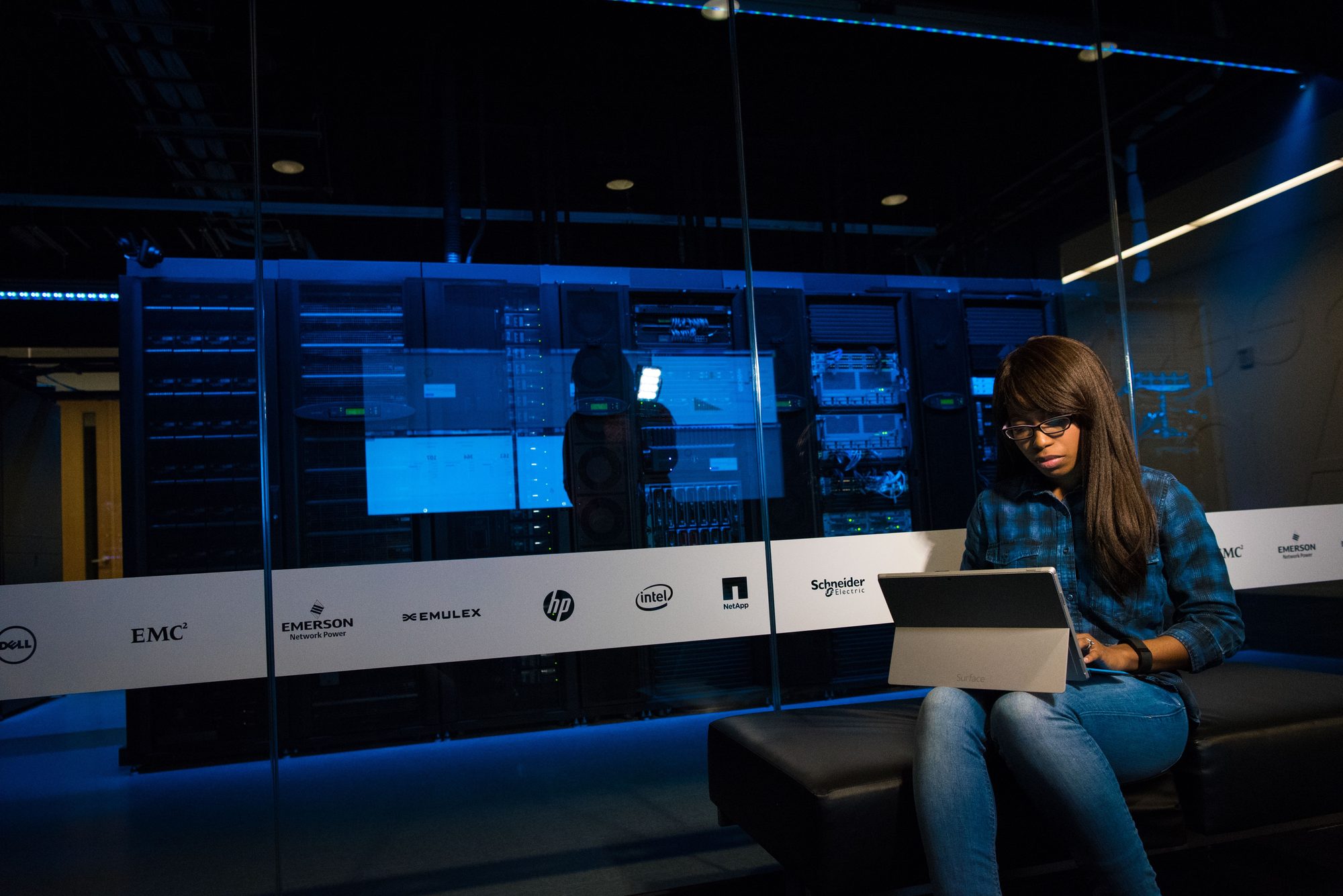 A member of the recovery systems team reviewing live campaign data